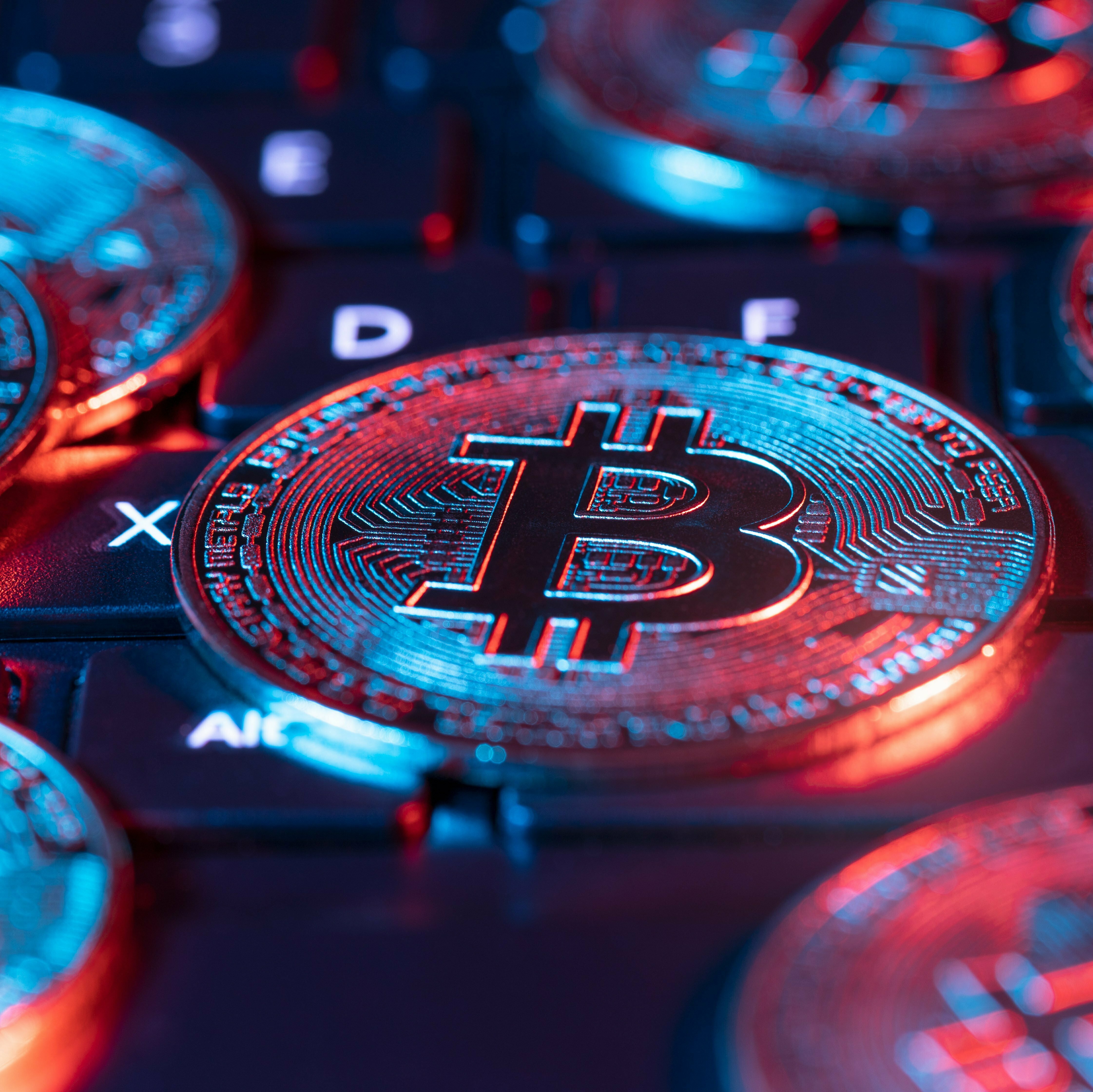 Bitcoin Valuation Falls by 17% Despite Spot ETF Approval 1 Bitcoin Replica on Computer Keyboard | Moonraker Talent Search